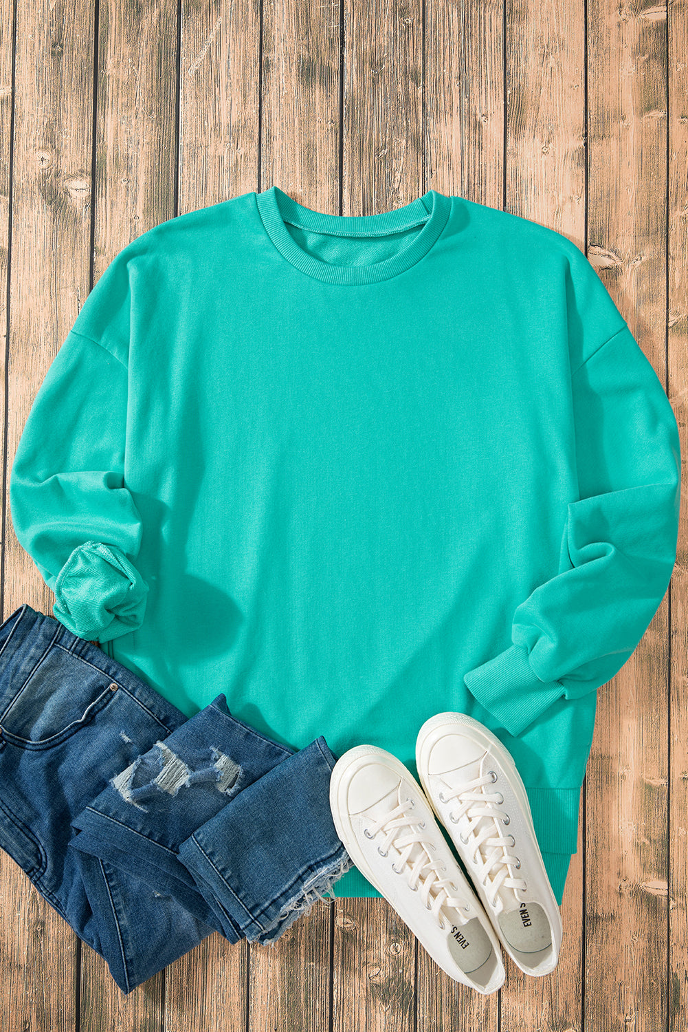 Aruba Blue Solid O Neck High Low Hem Pullover Sweatshirt