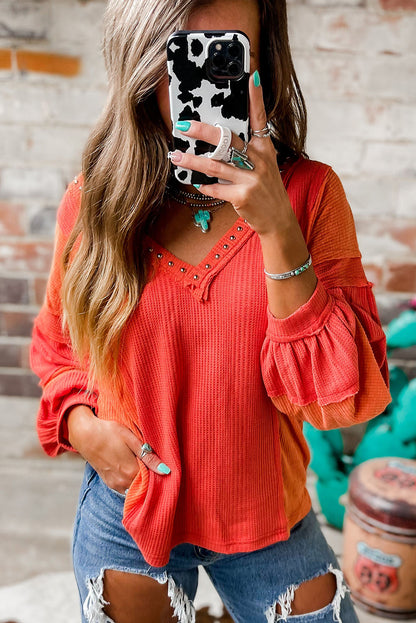 Fiery Red Studded V Neckline Exposed Seam Textured Knit Top