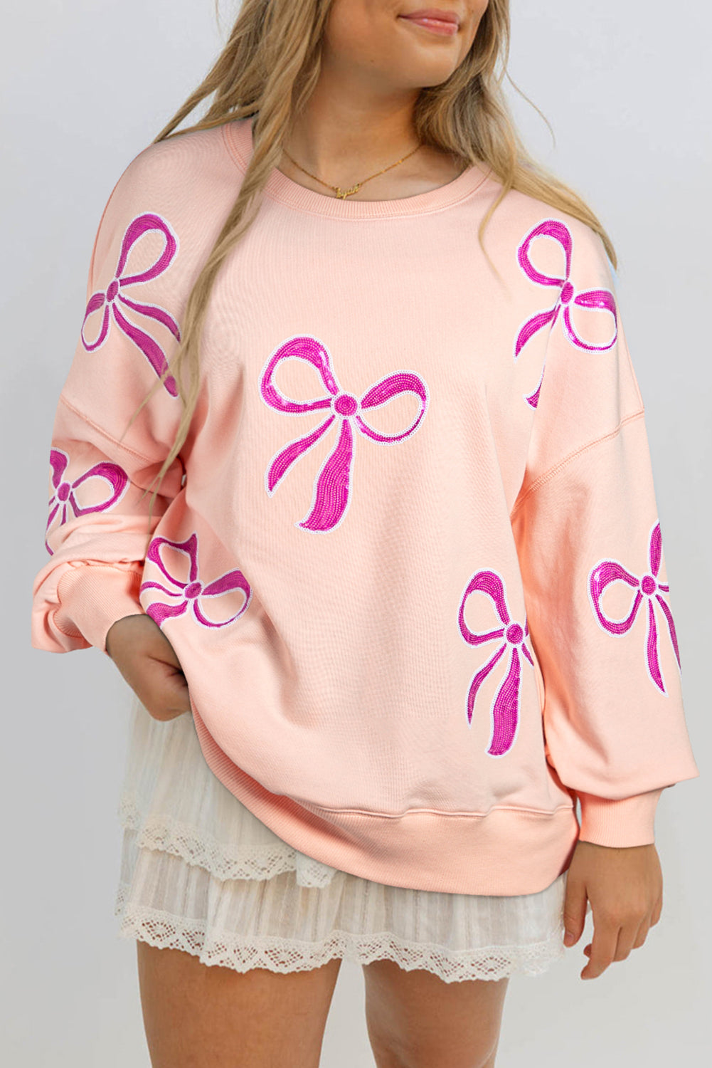 Apricot Pink Sequined Bowknot Drop Shoulder Oversized Sweatshirt