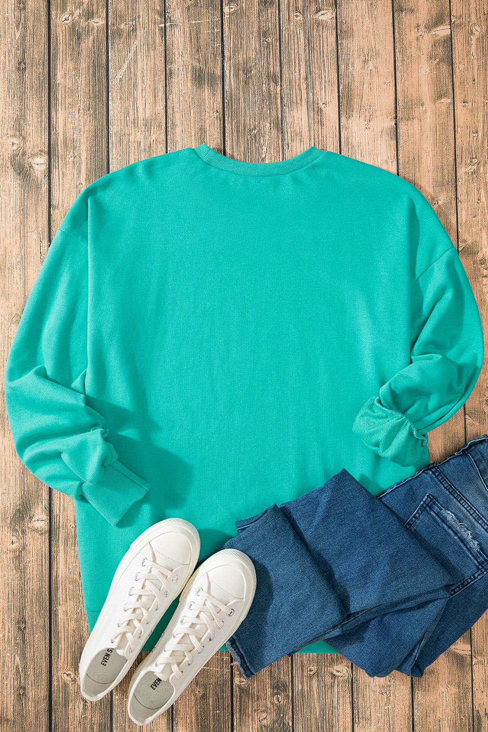 Aruba Blue Solid O Neck High Low Hem Pullover Sweatshirt